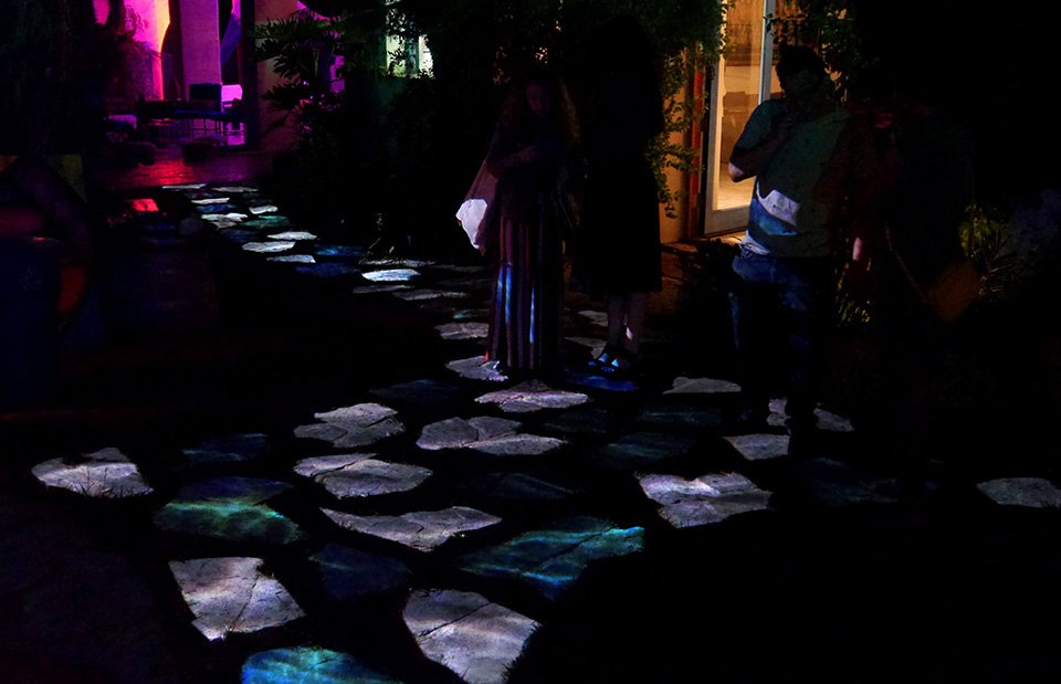 Individually video-mapped stepping stones wending their way through a garden in Laurel Canyon